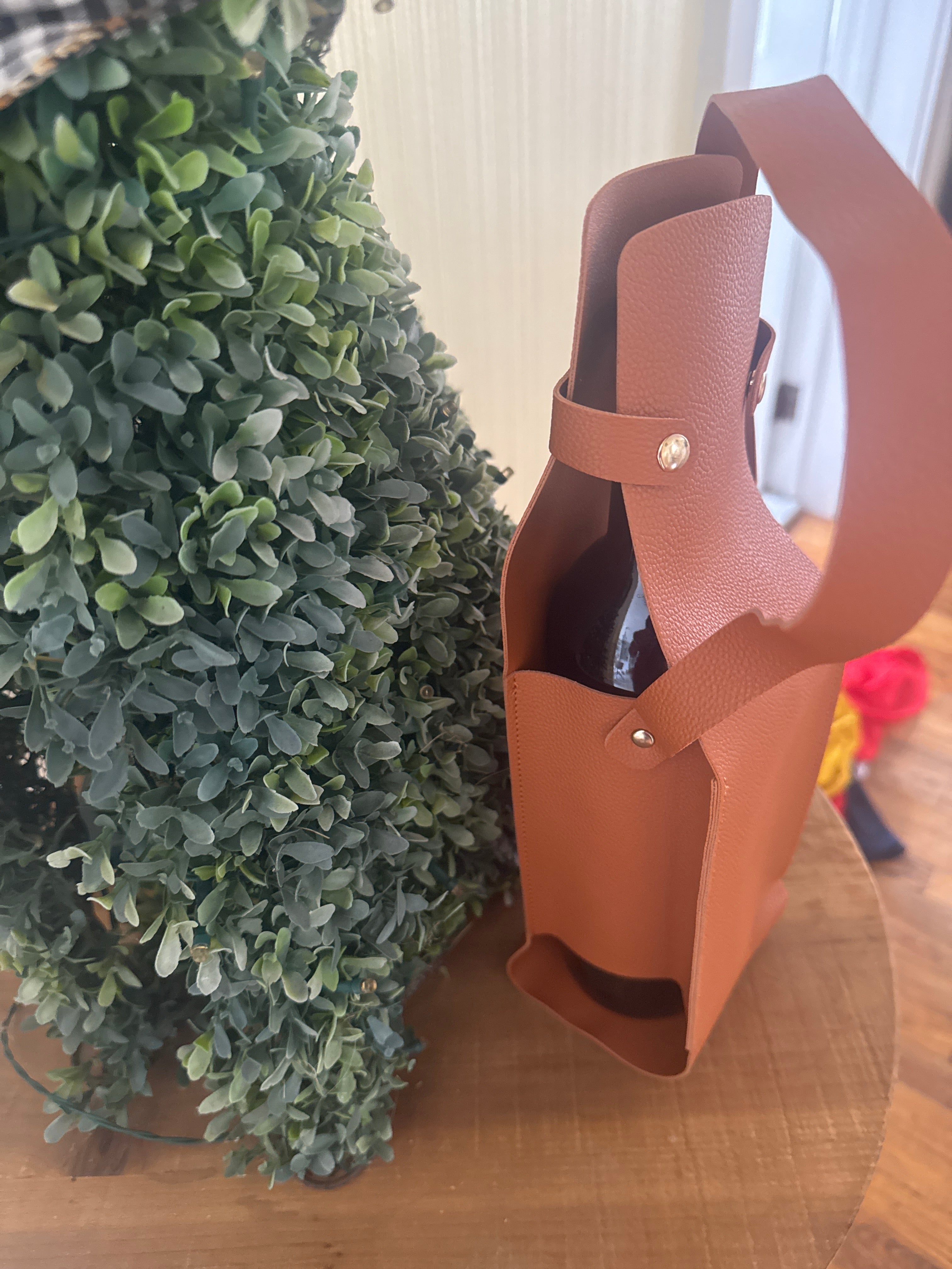 Wine bottle carrier