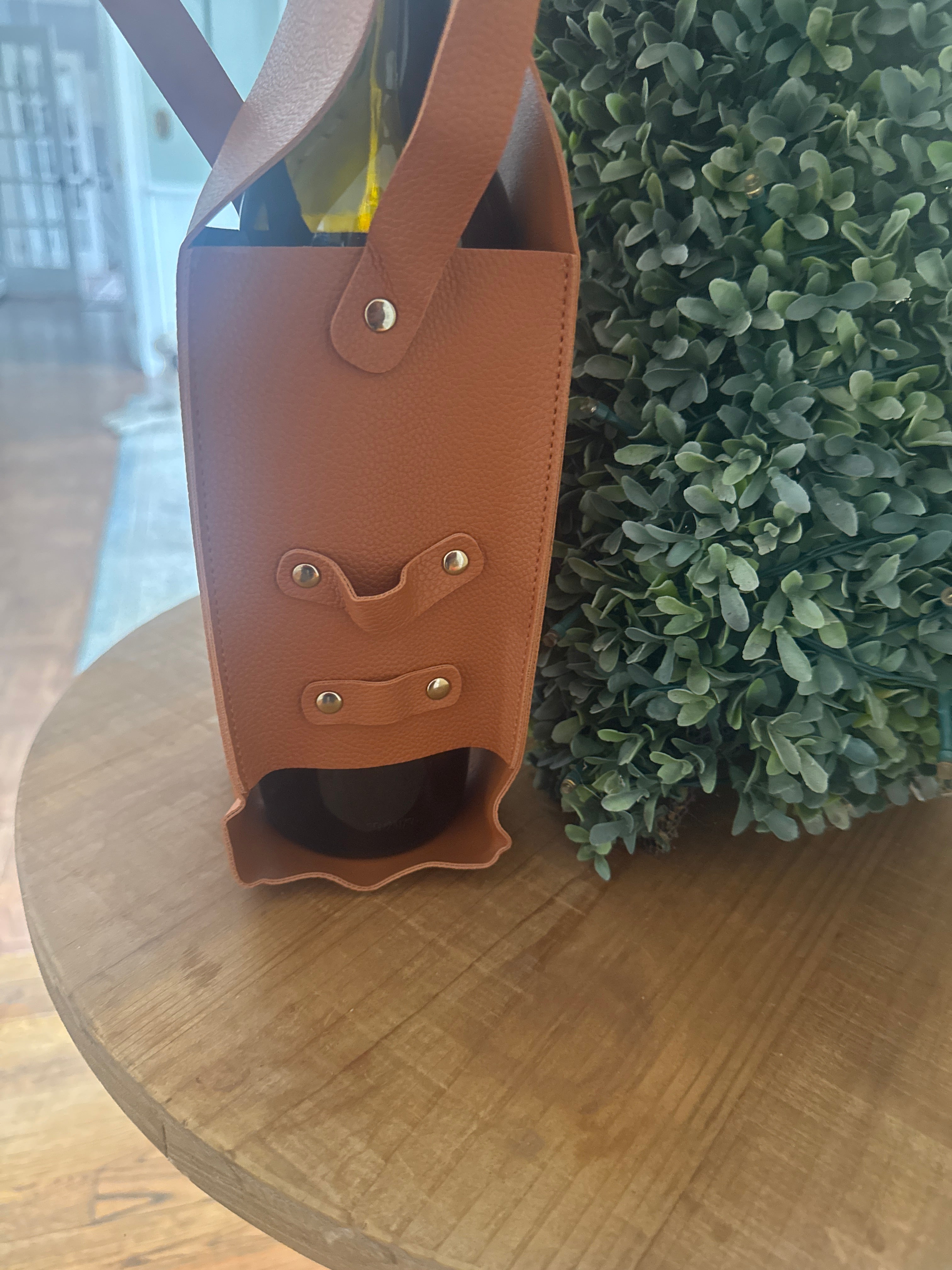 Wine bottle carrier