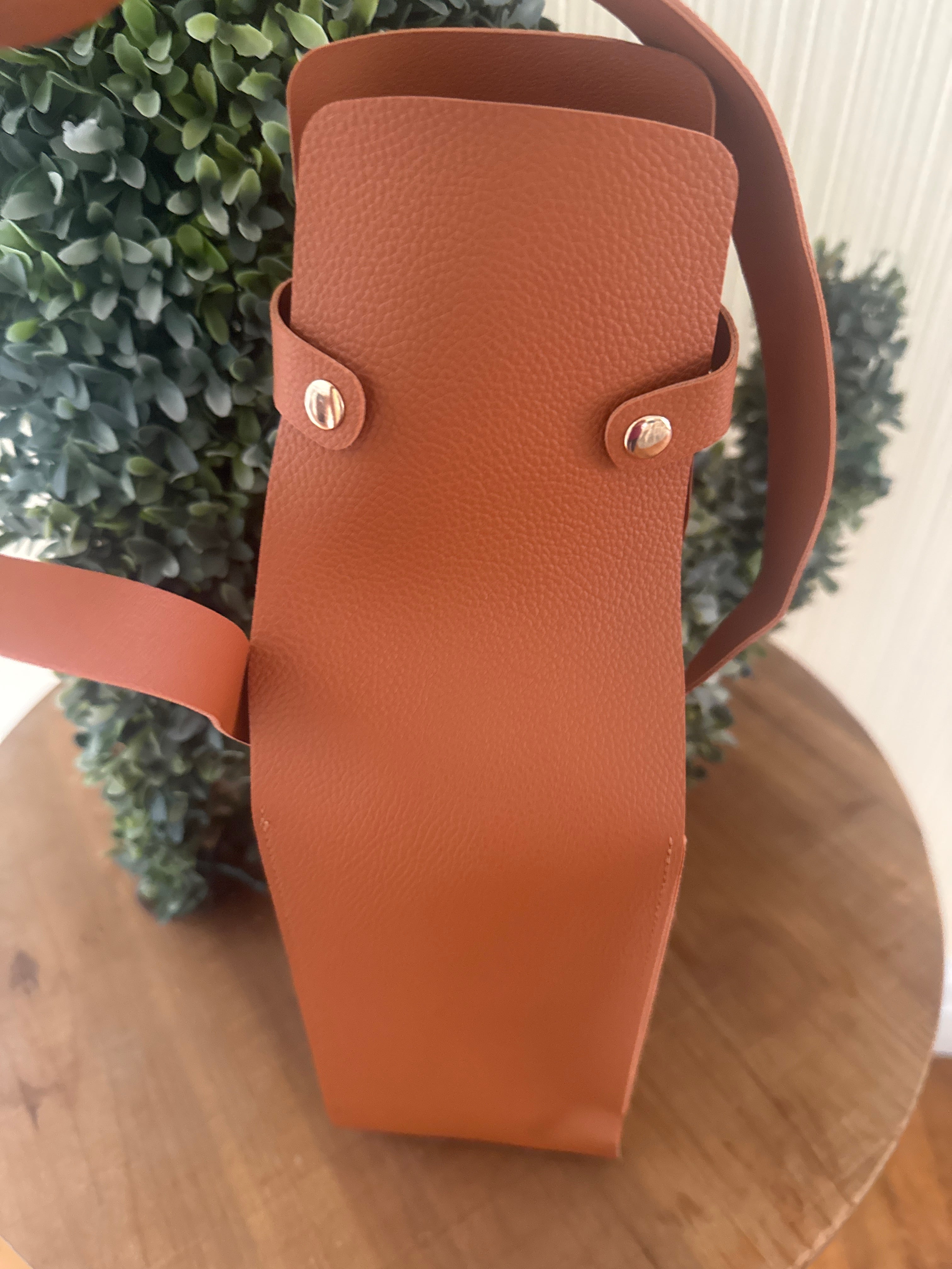 Wine bottle carrier